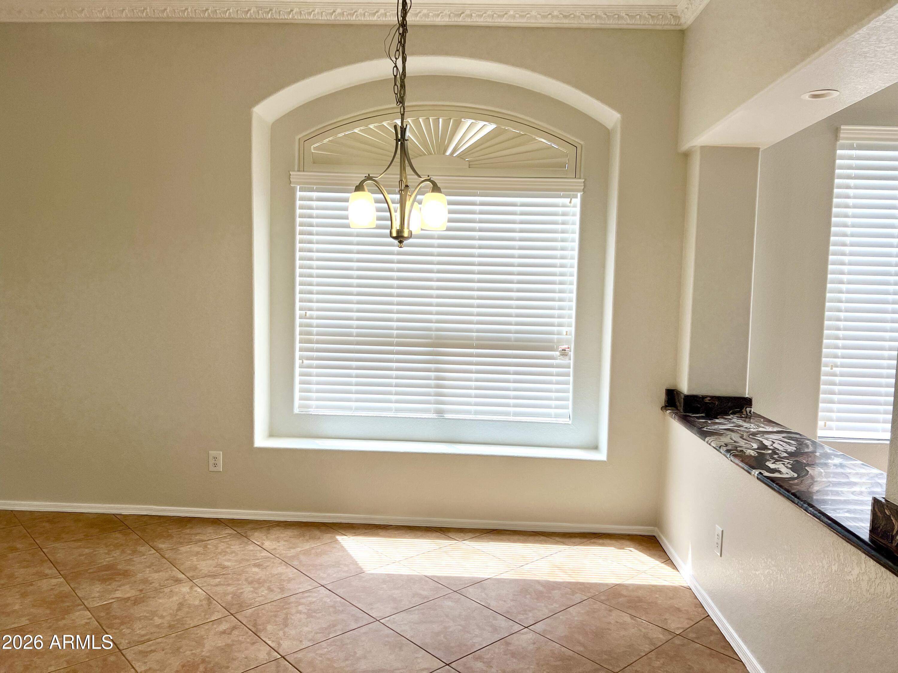 407 West Helena Drive Phoenix, AZ 85023 - Photo 5 of 35 a view of an empty room with a window