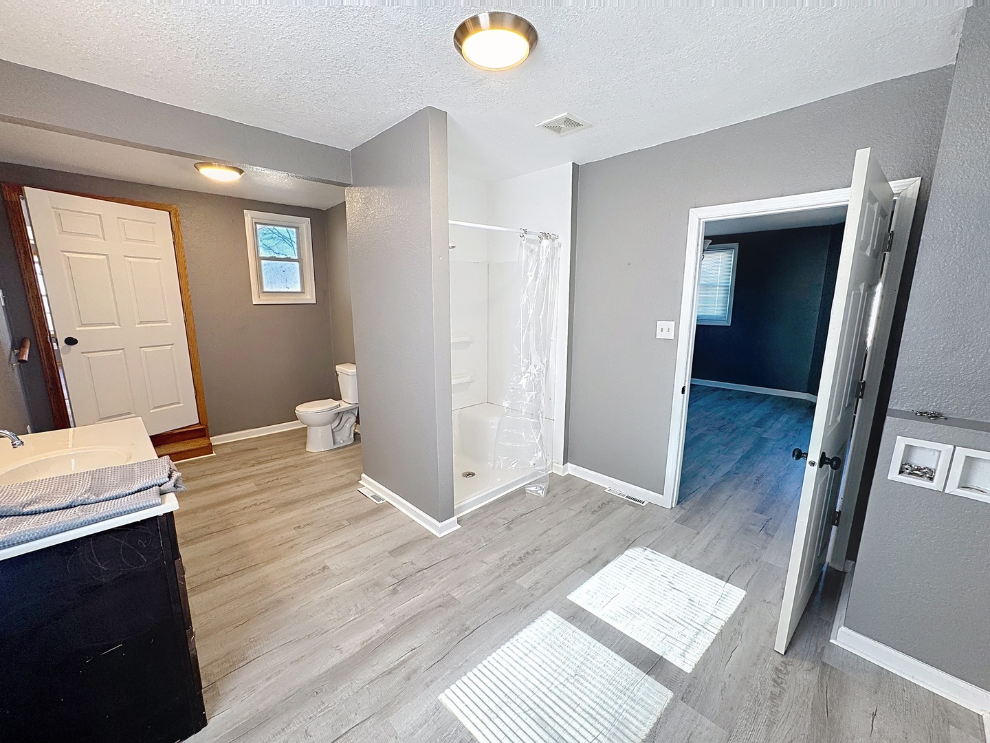 848 20th Avenue Moline, IL 61265 - Photo 11 of 20 a view of livingroom with hardwood floor and bathroom