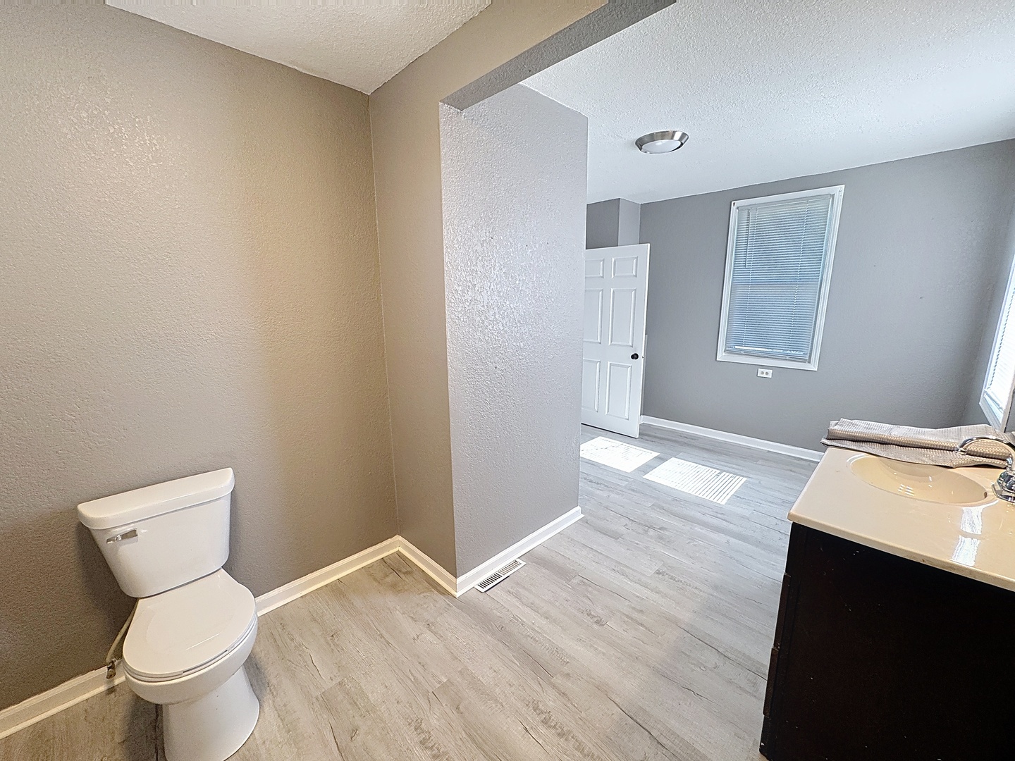 848 20th Avenue Moline, IL 61265 - Photo 12 of 20 a bathroom with a sink and a toilet