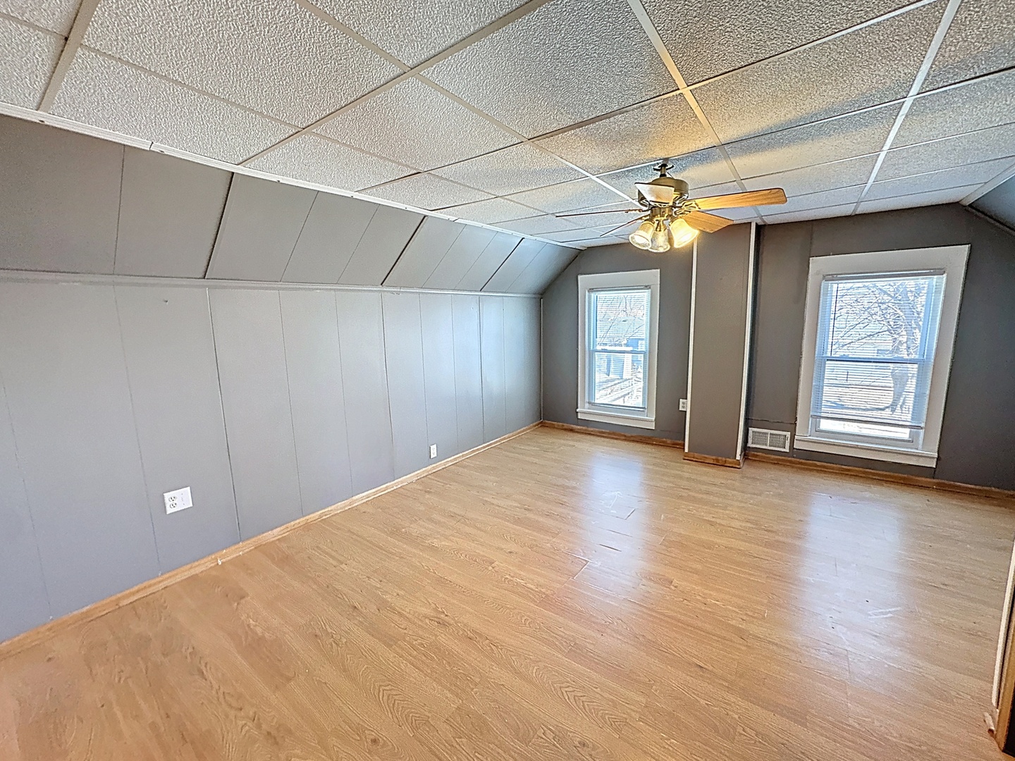 848 20th Avenue Moline, IL 61265 - Photo 13 of 20 a view of a livingroom with a chandelier fan and windows