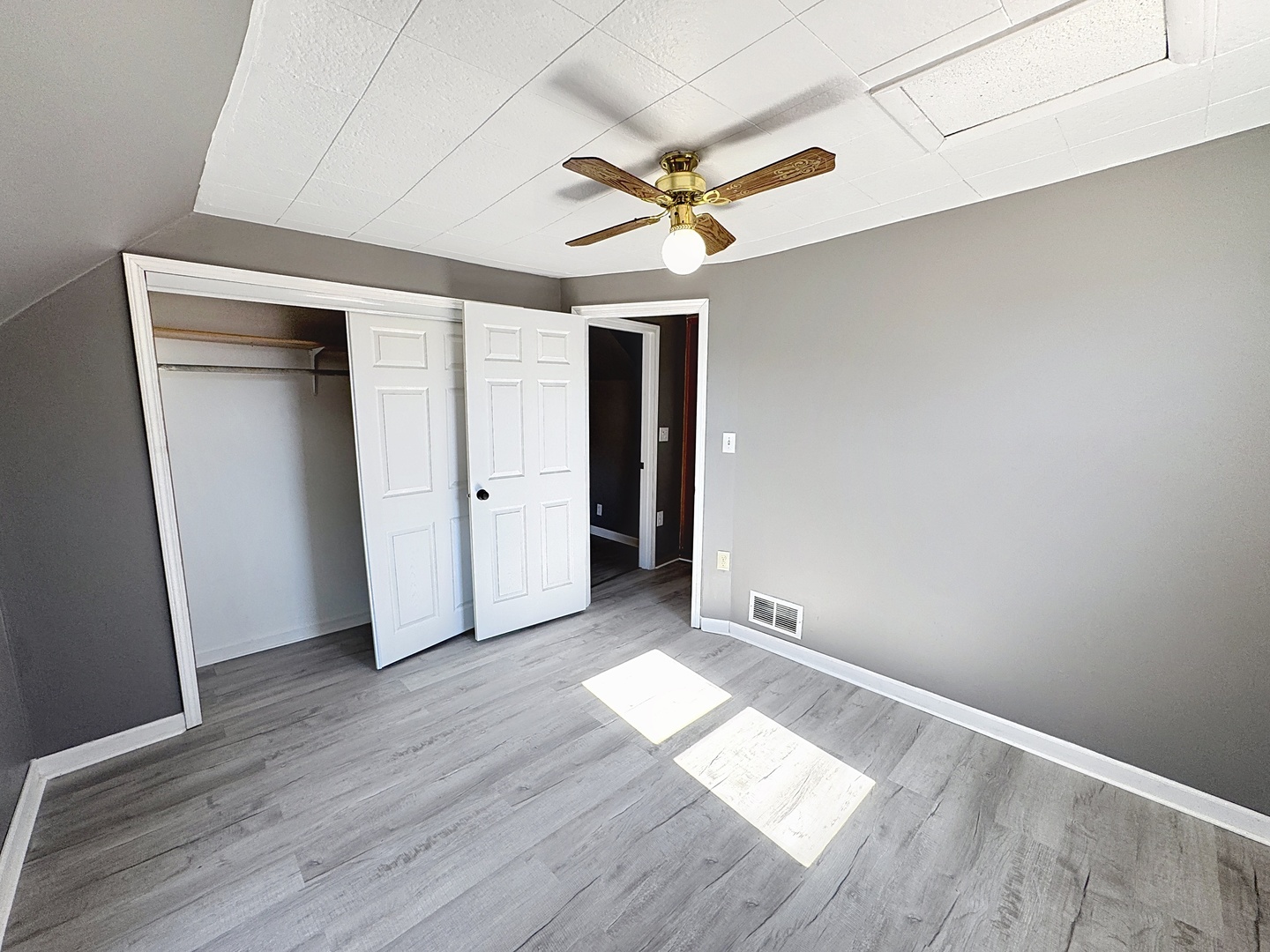 848 20th Avenue Moline, IL 61265 - Photo 18 of 20 an empty room with wooden floor closet and windows