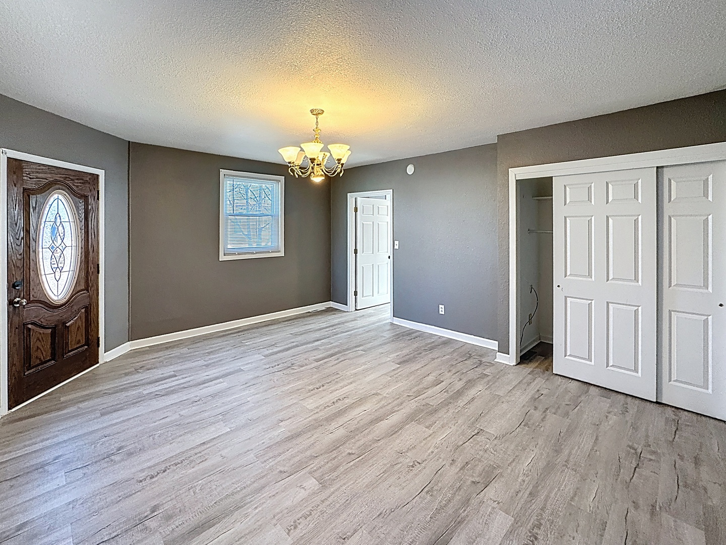 848 20th Avenue Moline, IL 61265 - Photo 10 of 20 an empty room with wooden floor mirror and window