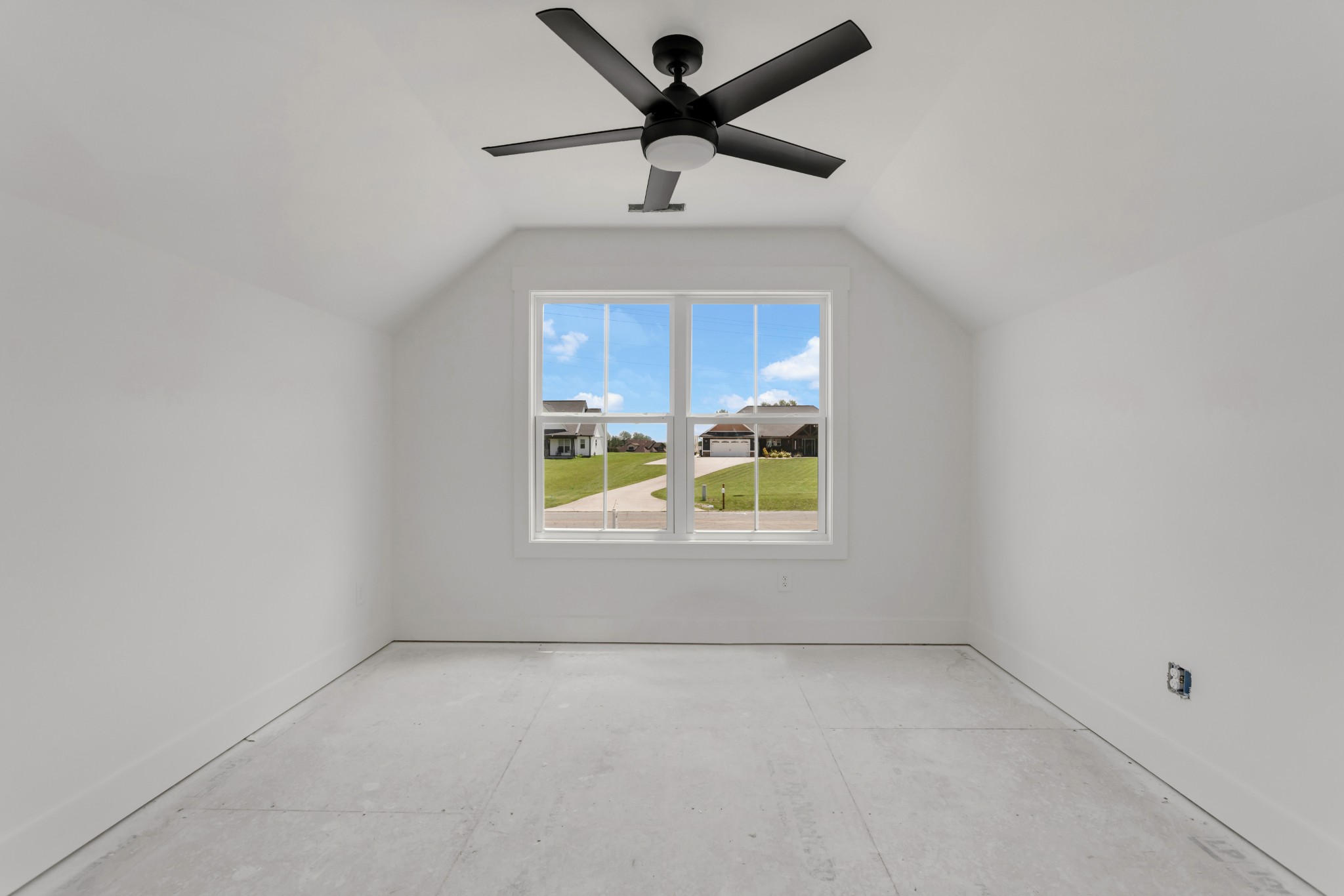 1171 Abiff Road Bon Aqua, TN 37025 - Photo 28 of 45 en empty room with windows and ceiling fan