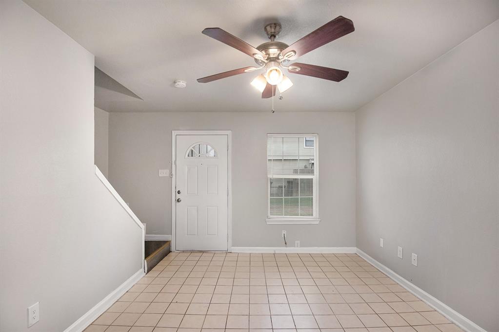 4936 Flamingo Road Fort Worth, TX 76119 - Photo 6 of 24 a view of an empty room with a window