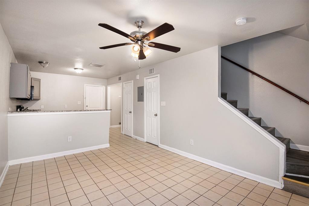 4936 Flamingo Road Fort Worth, TX 76119 - Photo 8 of 24 a view of an empty room and window