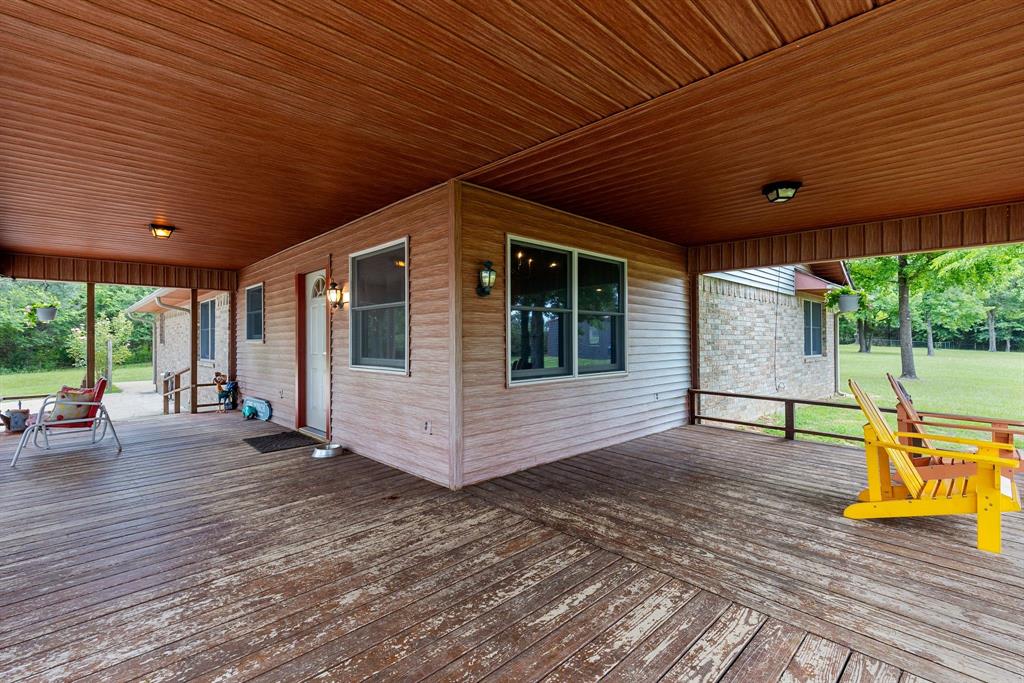476 Private Road 7326 Emory, TX 75440 - Photo 31 of 33 a view of a patio with wooden floor