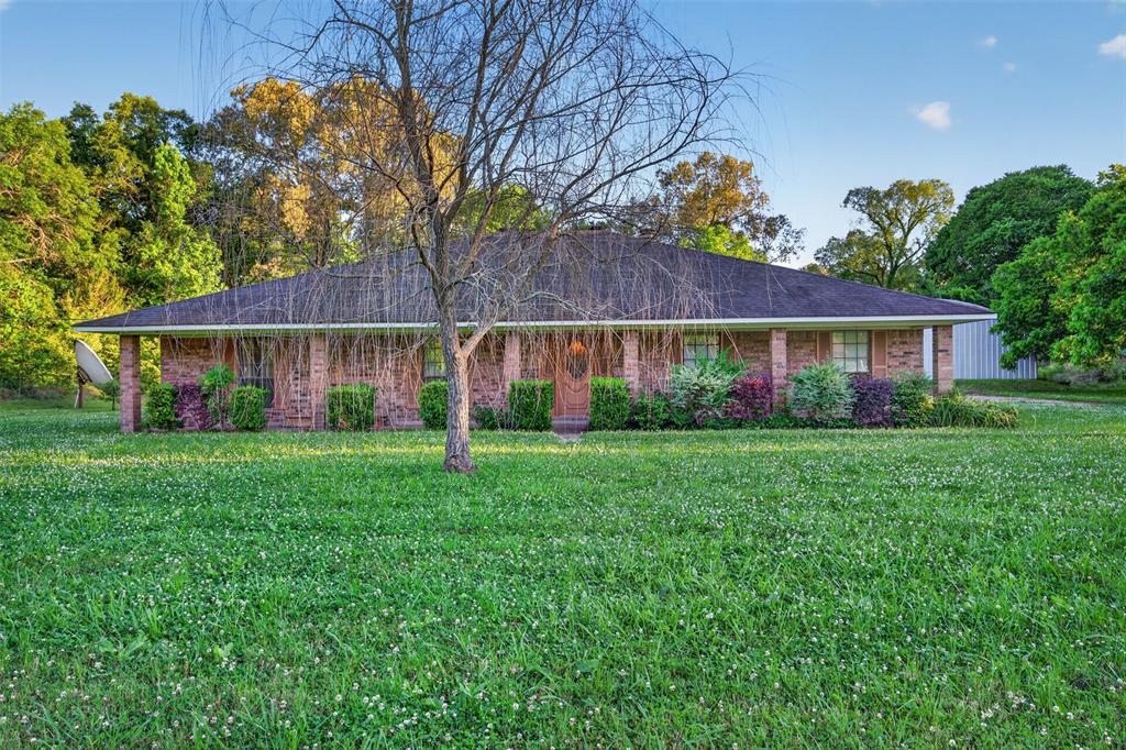 401 Cane Bend Drive Haughton, LA 71037 - Photo 1 of 27 a front view of house with yard and green space