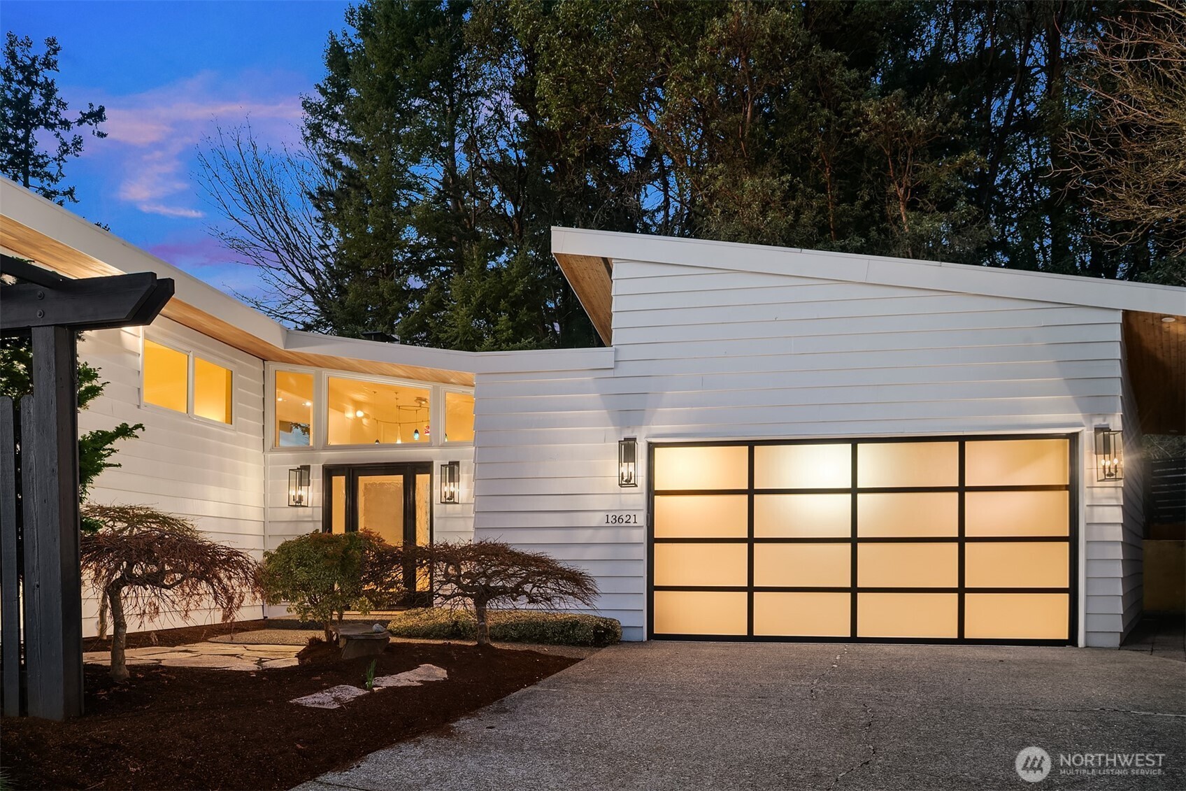 13621 18th Avenue Southwest Burien, WA 98166 - Photo 2 of 40 a view of a blue house with a street