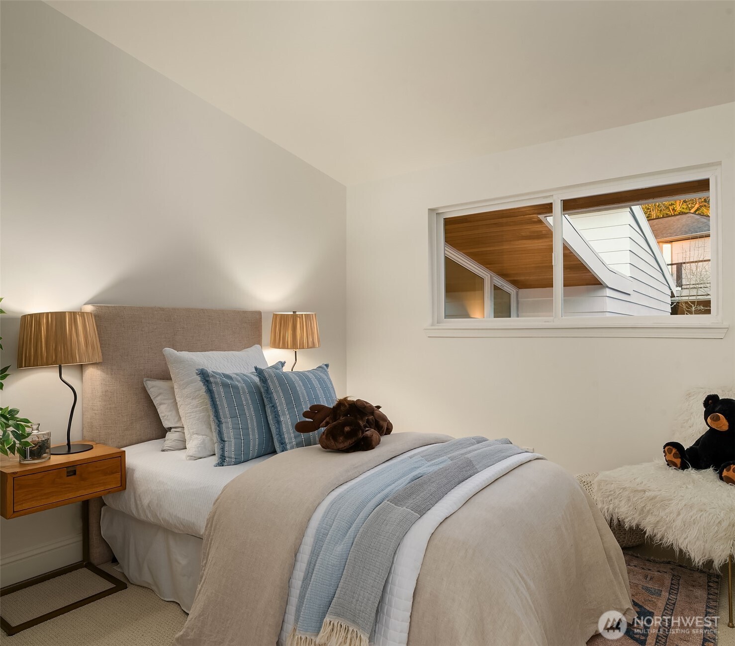 13621 18th Avenue Southwest Burien, WA 98166 - Photo 22 of 40 a bedroom with a bed and a window