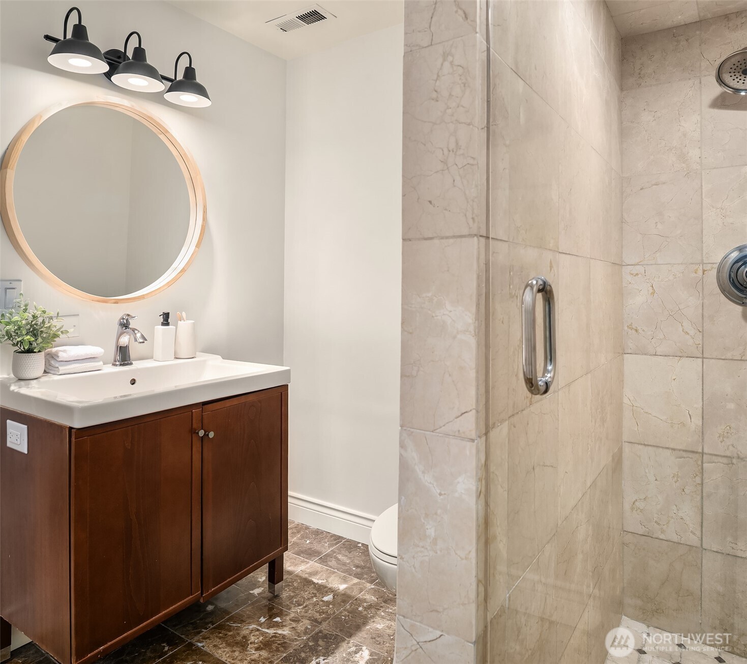 13621 18th Avenue Southwest Burien, WA 98166 - Photo 30 of 40 a bathroom with a sink vanity granite and a mirror