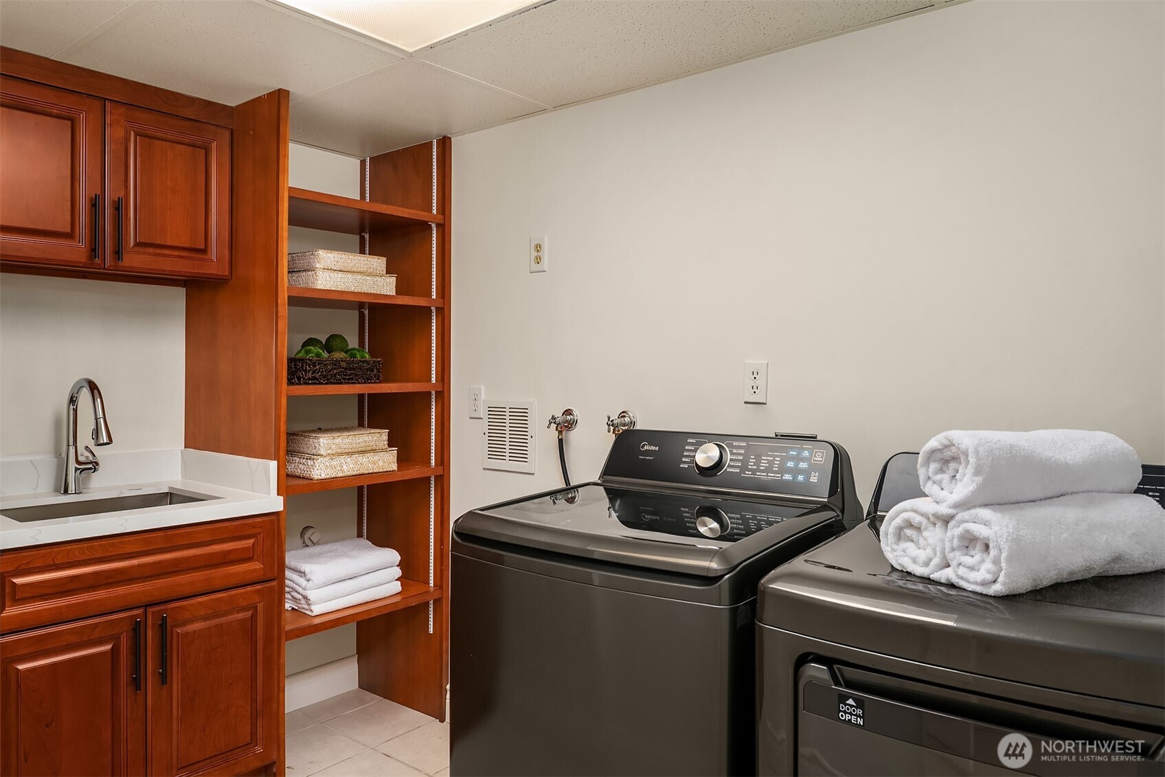 13621 18th Avenue Southwest Burien, WA 98166 - Photo 31 of 40 a utility room with dryer and washer