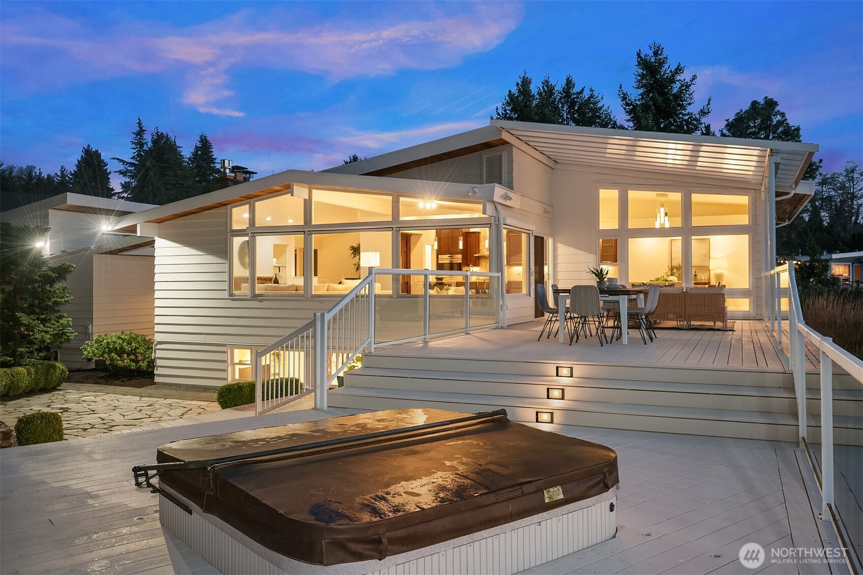 13621 18th Avenue Southwest Burien, WA 98166 - Photo 35 of 40 a view of a house with a swimming pool and sitting area