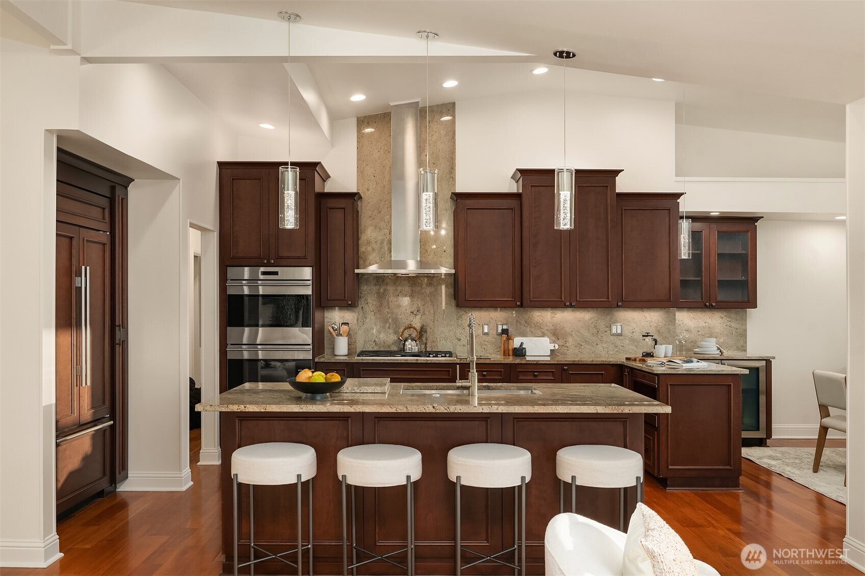 13621 18th Avenue Southwest Burien, WA 98166 - Photo 9 of 40 a kitchen with kitchen island granite countertop a sink and cabinets