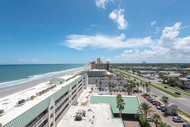 a view of a city with an ocean
