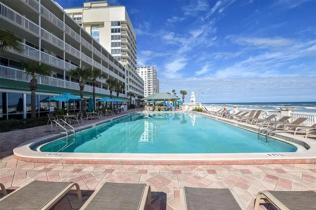 a view of an ocean and a kitchen