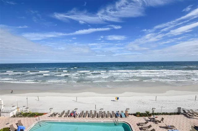 a terrace with a table and chairs