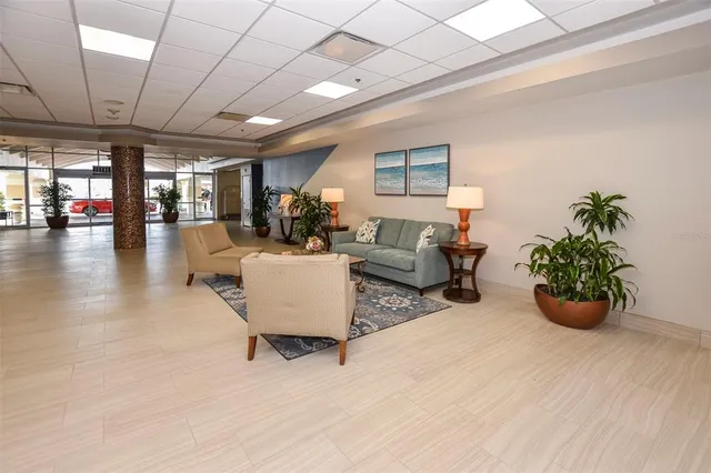 a front view of a building with a garden