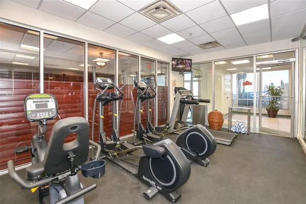 a view of a living room and balcony