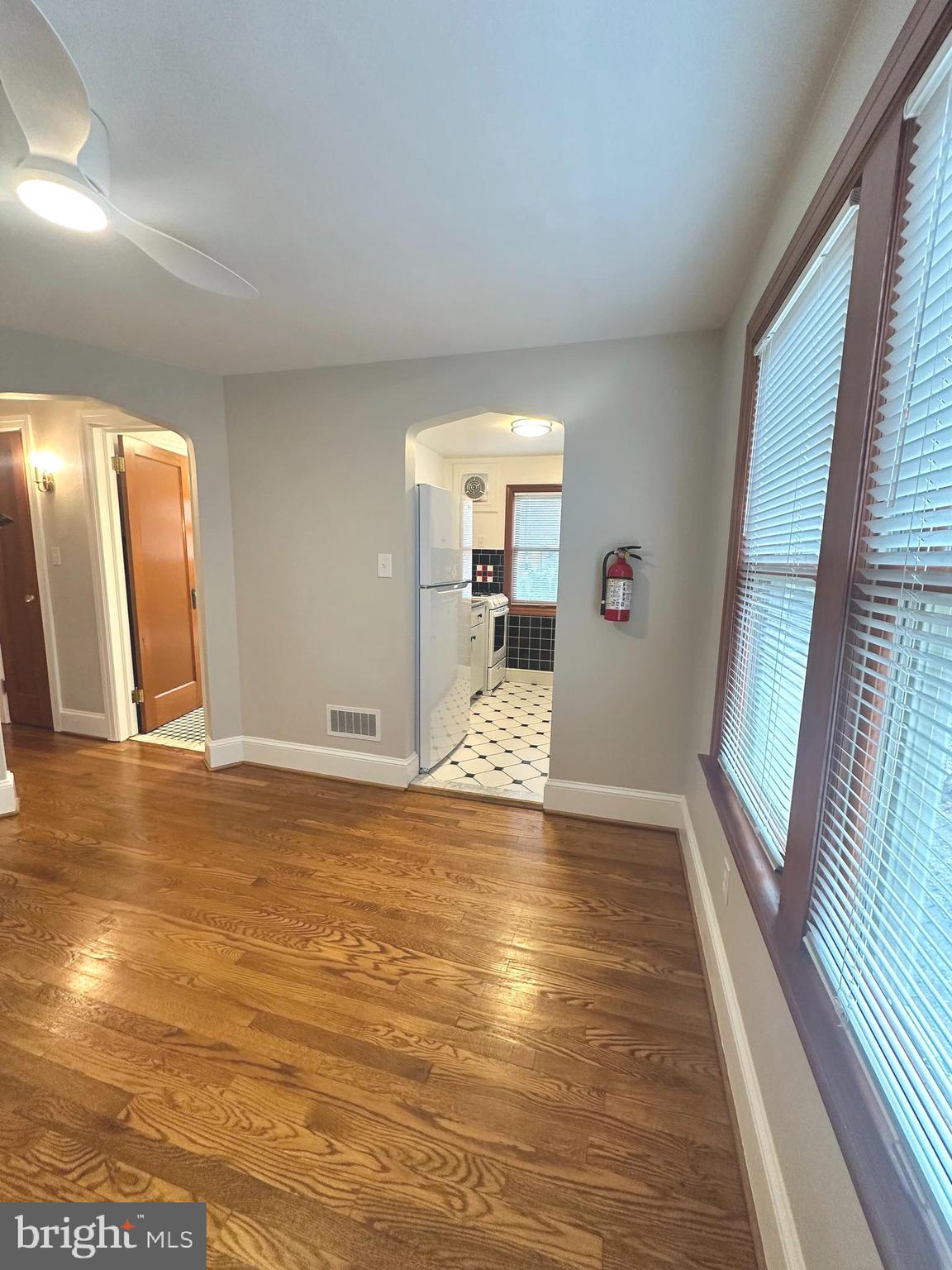 1009 Parkside Avenue, Unit 2 Ewing, NJ 08618 - Photo 15 of 23 a view of a living room with hardwood floor and a large window