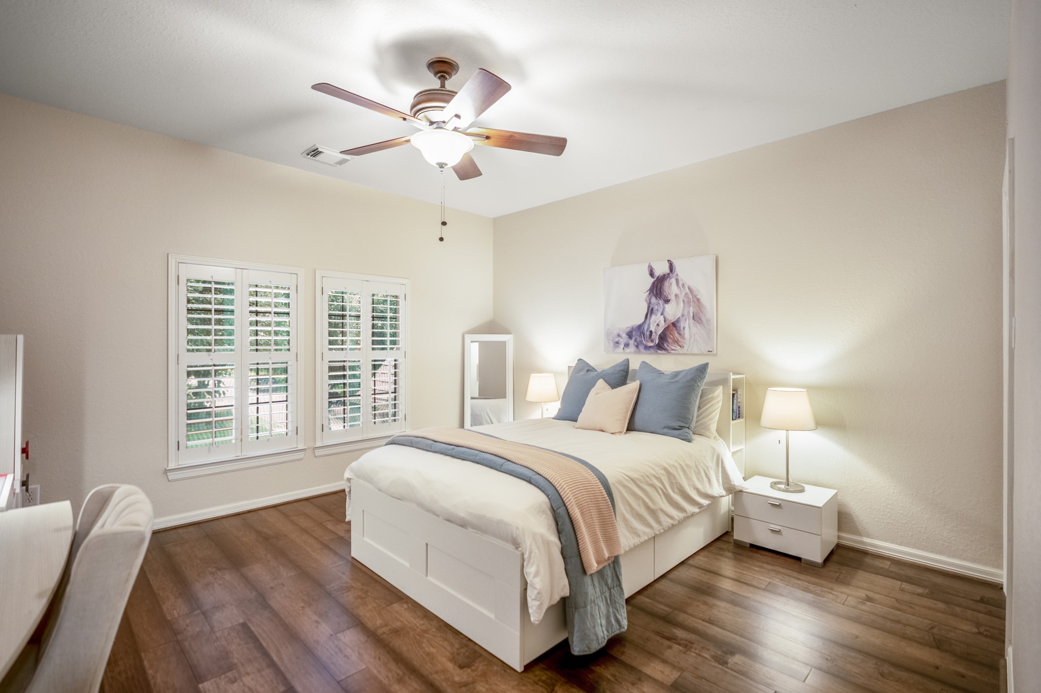67 North Pentenwell Circle Spring, TX 77382 - Photo 28 of 50 a bedroom with a bed and a chandelier