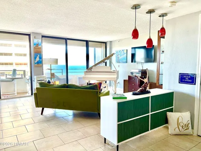 a view of a living room and a window