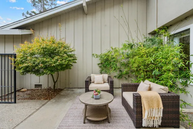 a backyard of a house with seating space