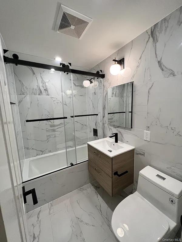55-30 99th Street, Unit 3F Queens, NY 11368 - Photo 6 of 8 a bathroom with a sink toilet and shower