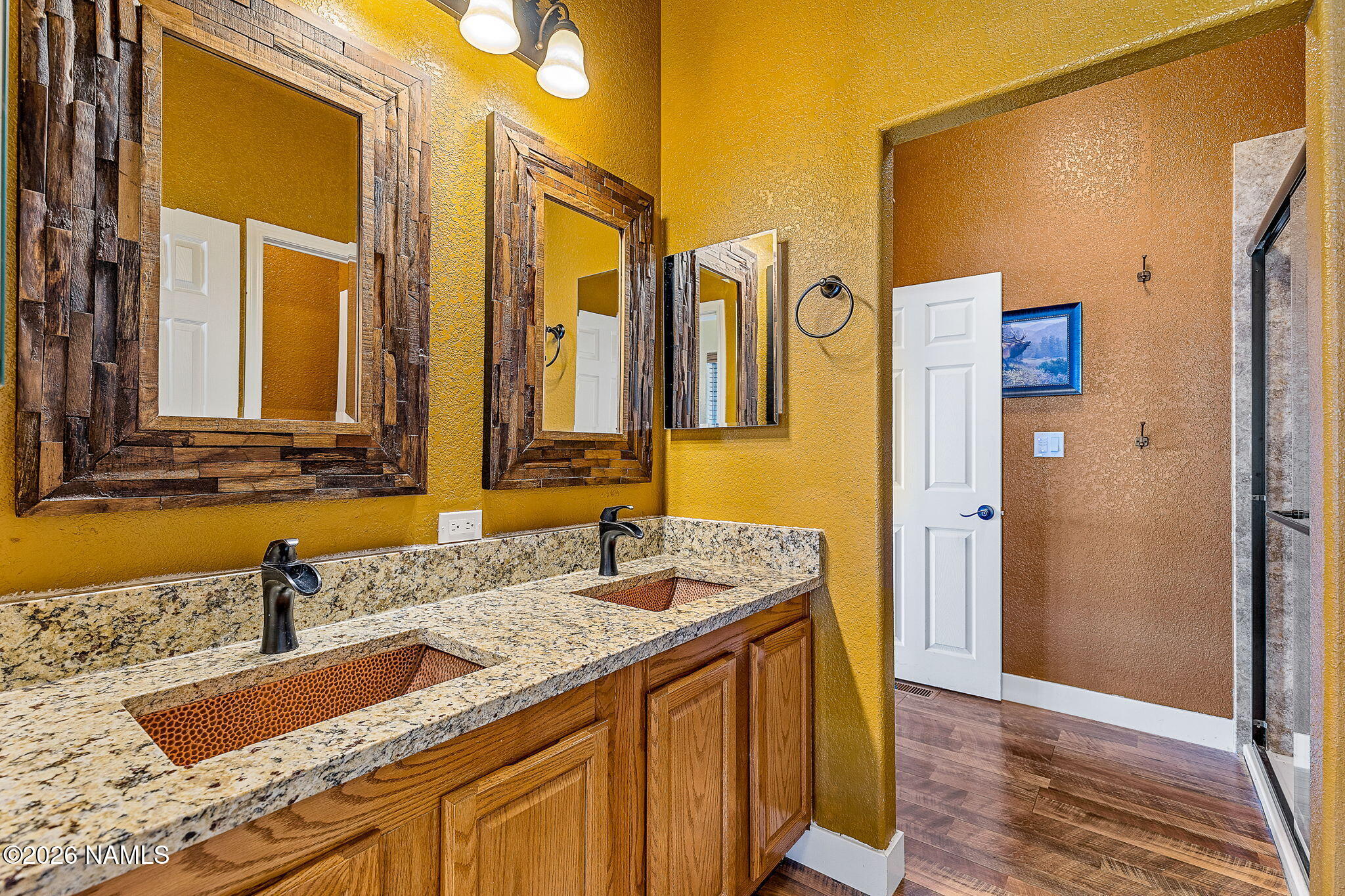 2318 Hoctor Road Williams, AZ 86046 - Photo 22 of 36 a bathroom with a granite countertop double vanity sink and a mirror