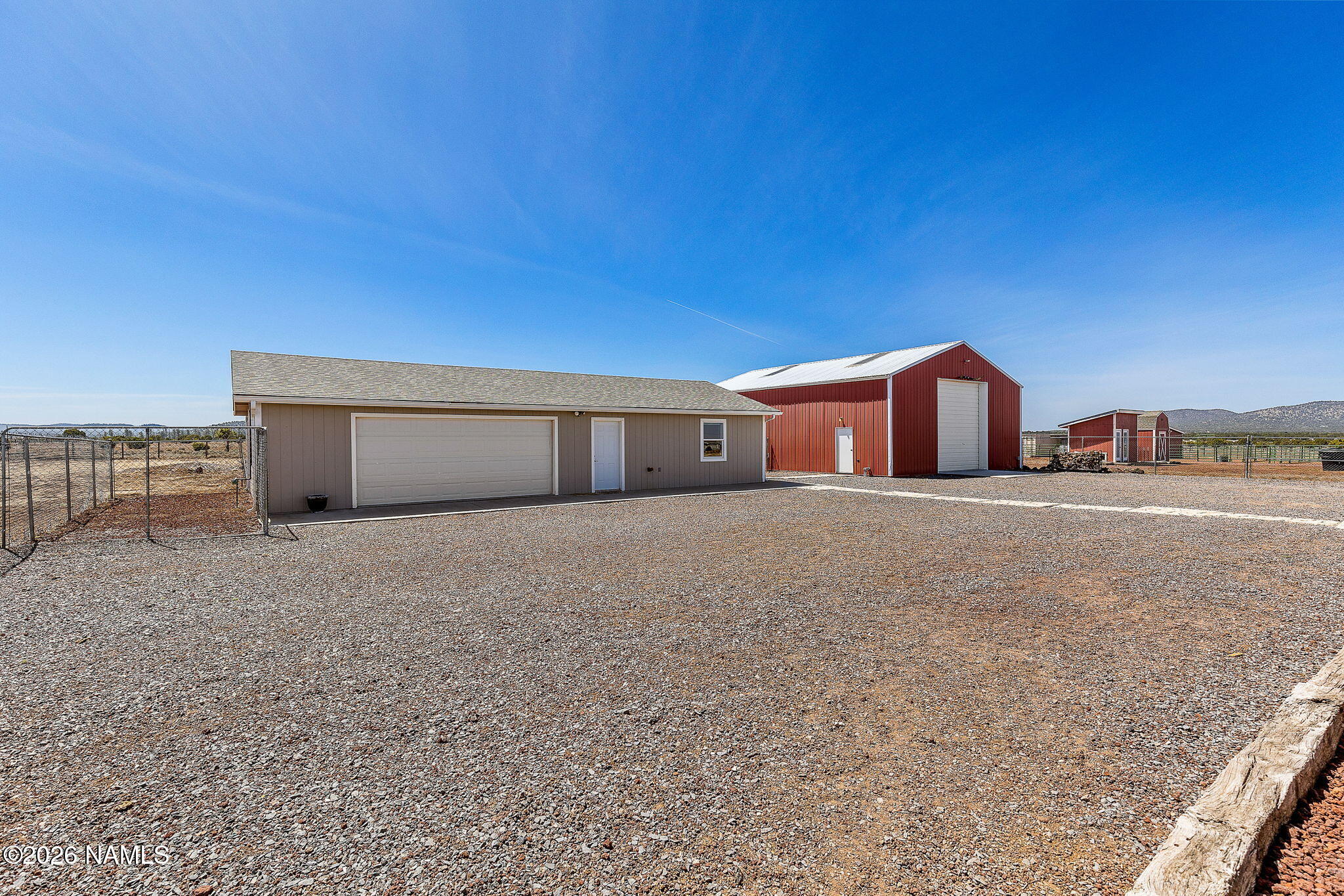 2318 Hoctor Road Williams, AZ 86046 - Photo 28 of 36 a front view of a house with a yard