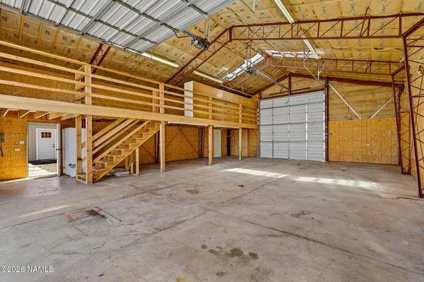 a view of a room with an empty space