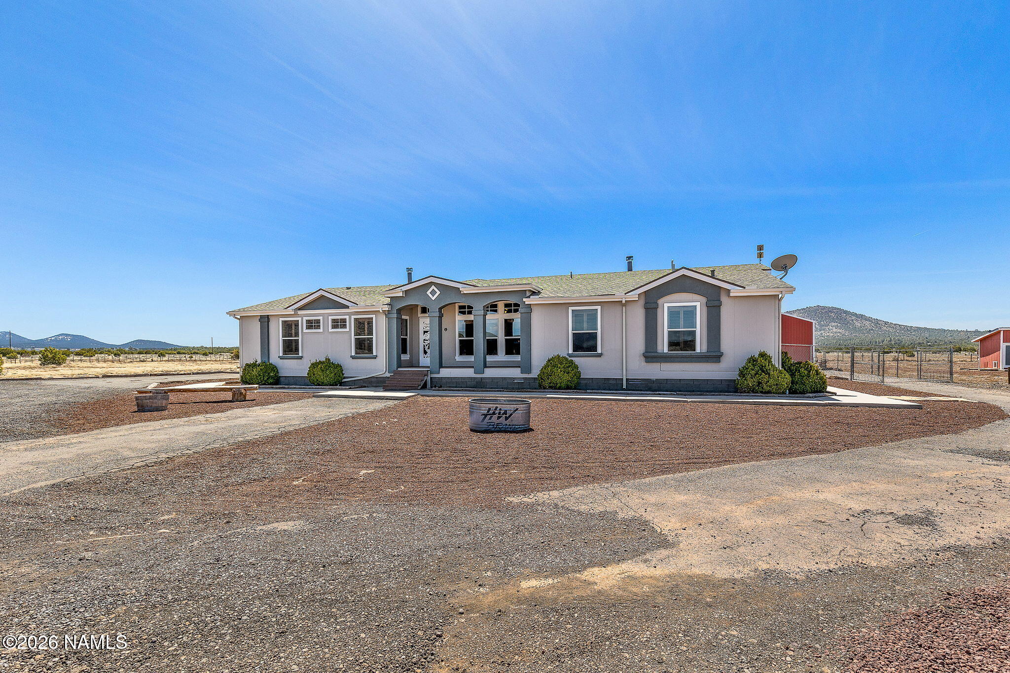 2318 Hoctor Road Williams, AZ 86046 - Photo 5 of 36 a front view of a house with a yard