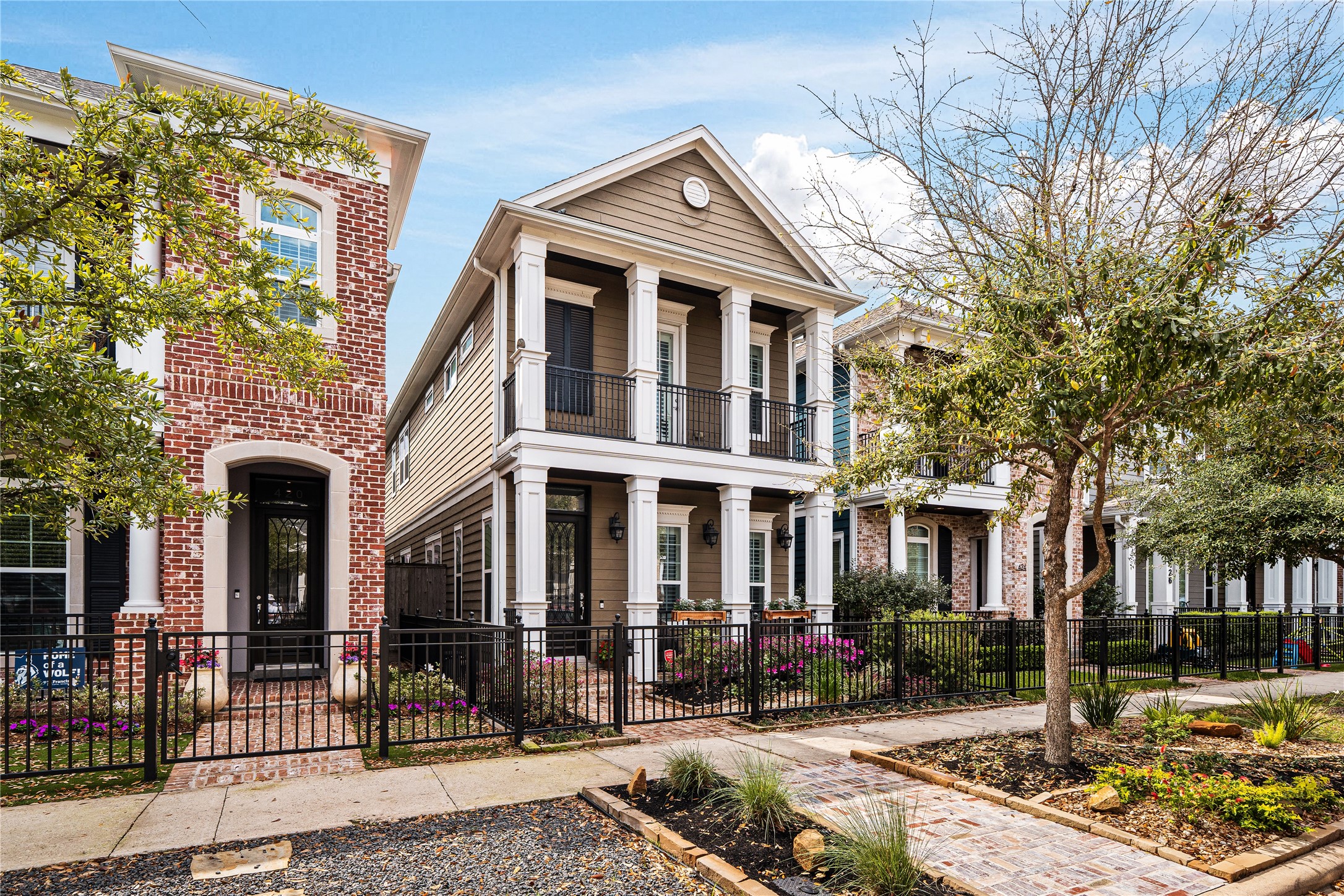 Tucked away on one of the Heights' widest tree-lined streets, this masterfully kept Drake Homes residence offers a perfect blend of traditional charm and recent updates.