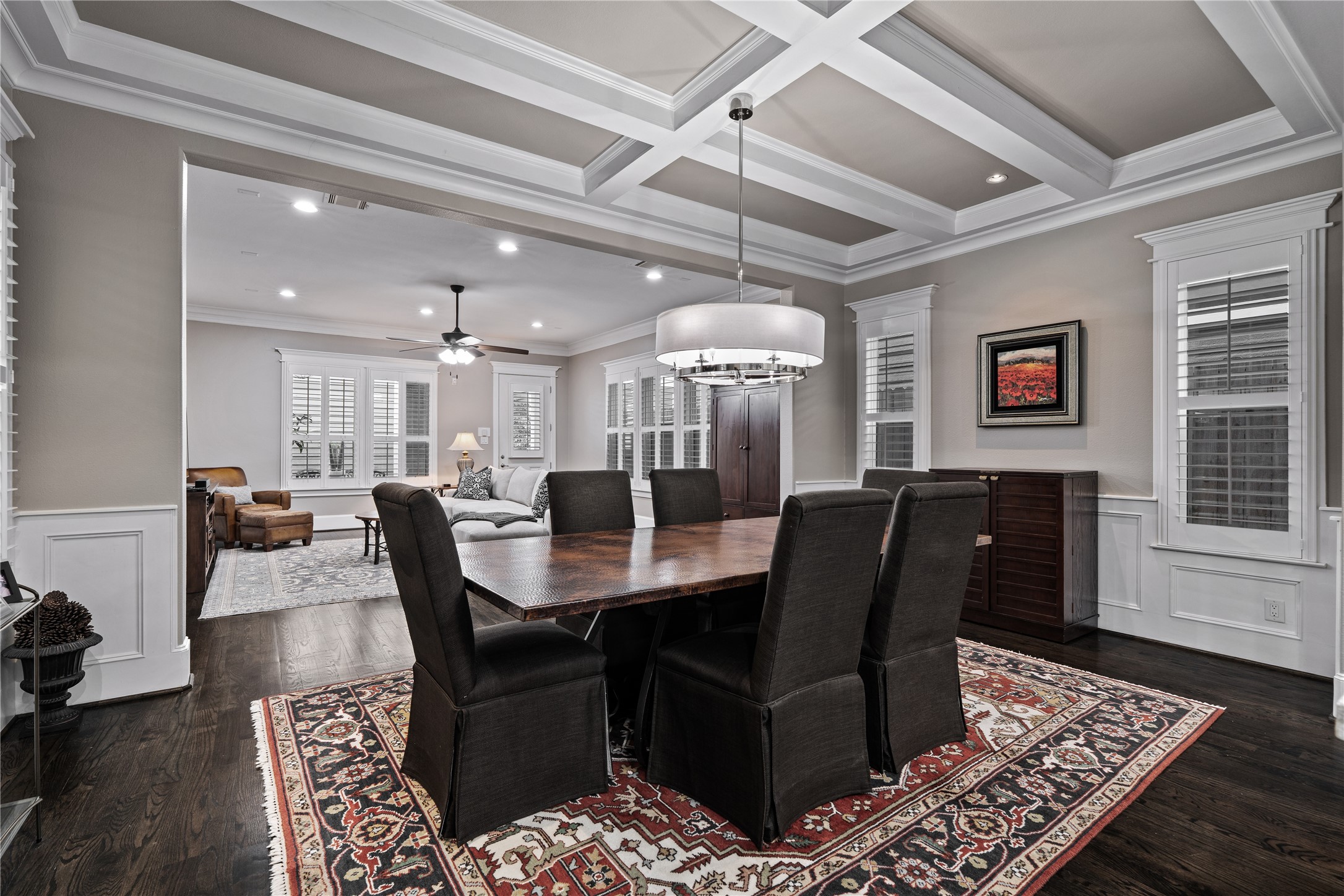 422 West 26th Street Houston, TX 77008 - Photo 13 of 39 The formal dining room is a sophisticated space for hosting, with coffered ceilings and classic plantation shutters.