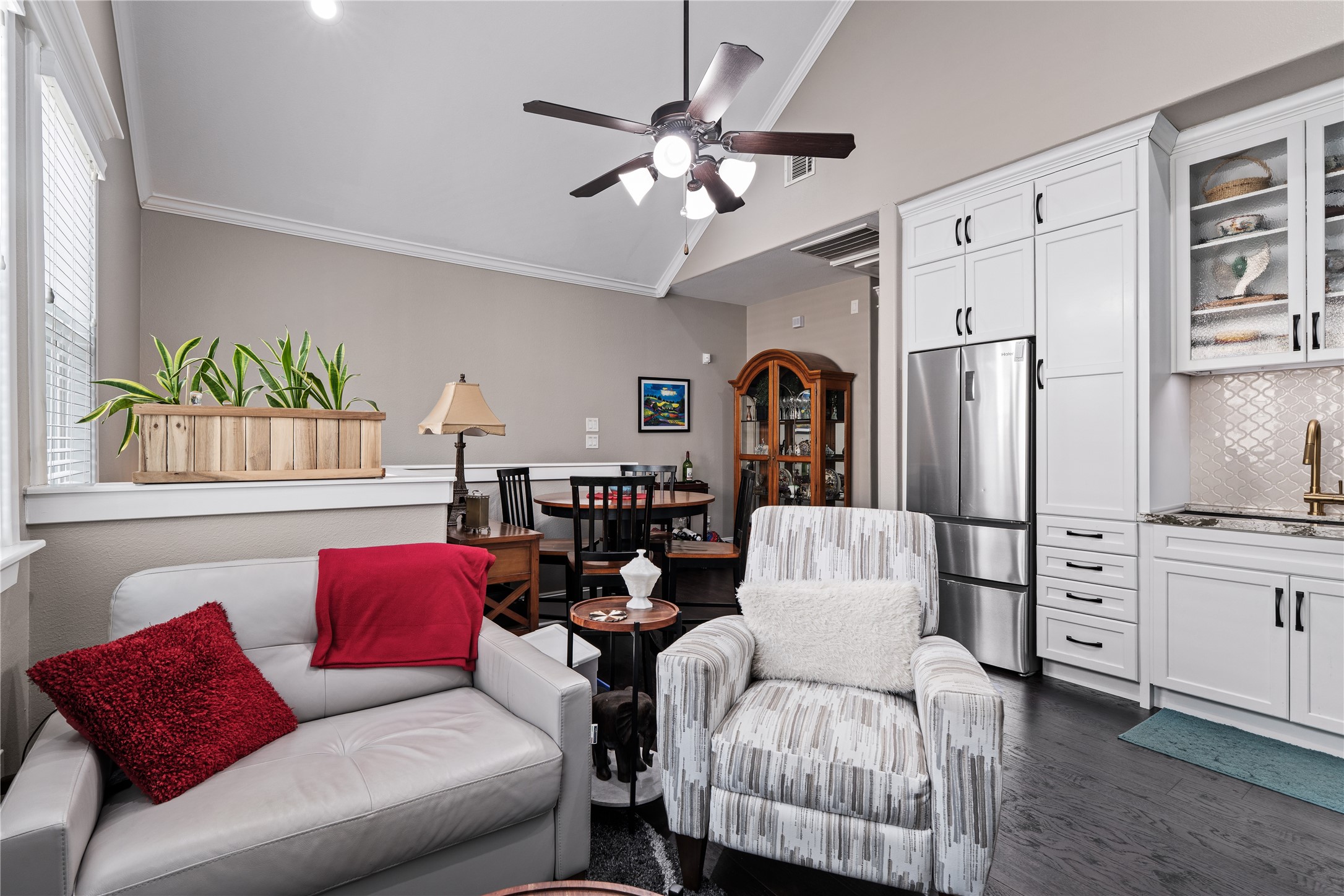 422 West 26th Street Houston, TX 77008 - Photo 3 of 39 A rare and high-value feature of this property is the 567-square-foot detached garage apartment, which offers a private, vaulted living space complete with its own full kitchenette. Updated recently with a new AC and furnace + tankless water heater this versatile suite is finished with luxury vinyl flooring and is perfect for a home office, guest quarters, or rental income.