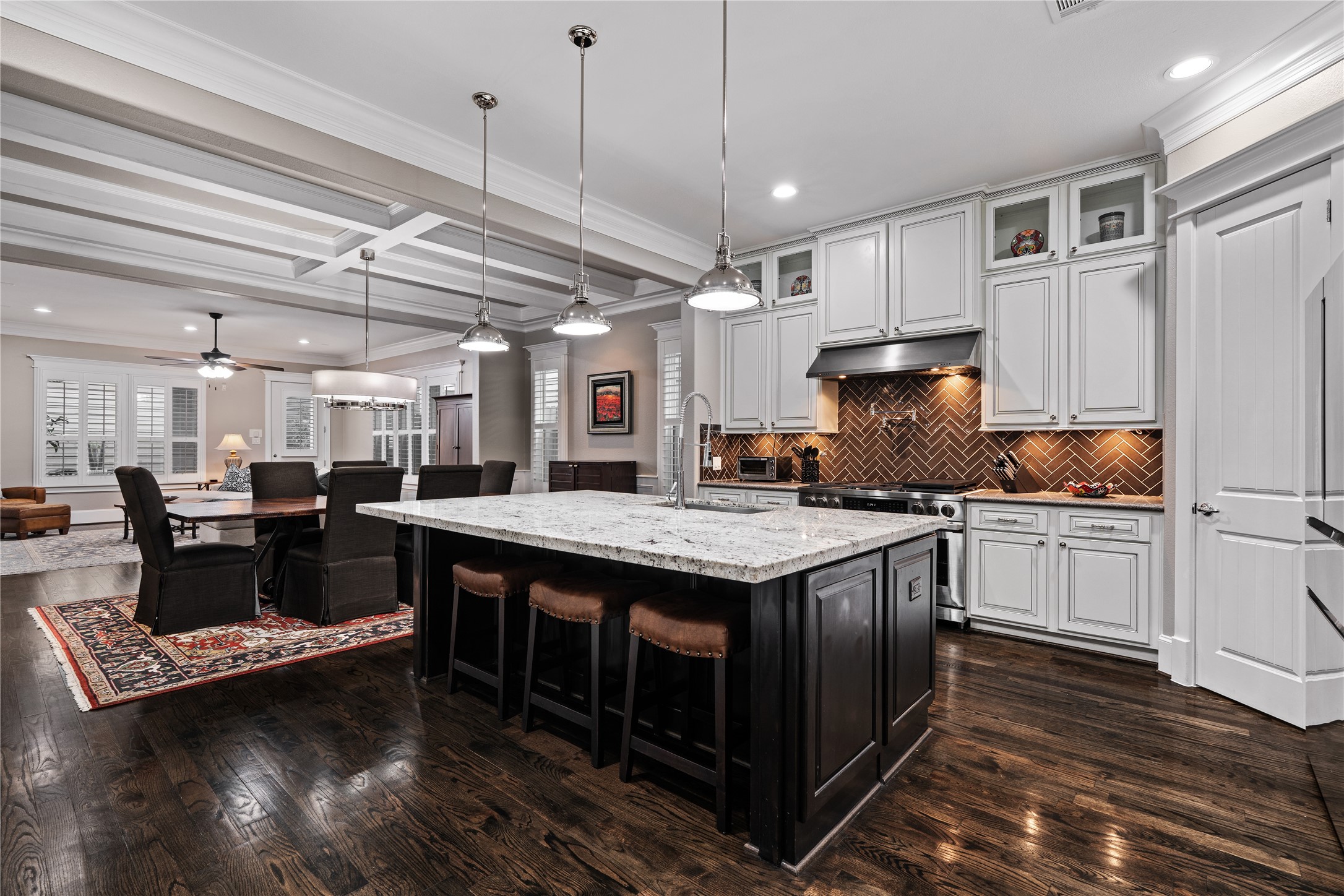422 West 26th Street Houston, TX 77008 - Photo 10 of 39 The chef's kitchen is anchored by a massive granite island that provides a spacious breakfast bar and extra prep room.
