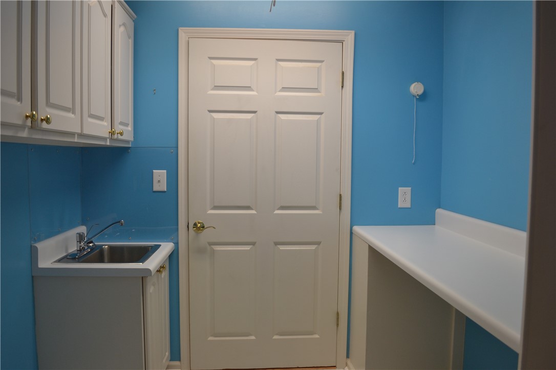 103 Kilsprings Road Anderson, SC 29621 - Photo 11 of 46 Laundry room with cabinets and folding counter, mo