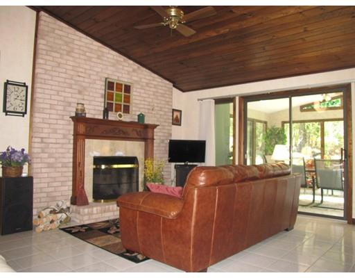 39 Carrington Road Montgomery, MA 01085 - Photo 2 of 23 a living room with furniture and a fireplace