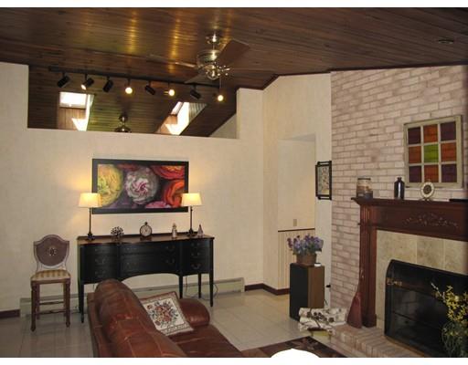39 Carrington Road Montgomery, MA 01085 - Photo 3 of 23 a living room with furniture a dining table and chairs