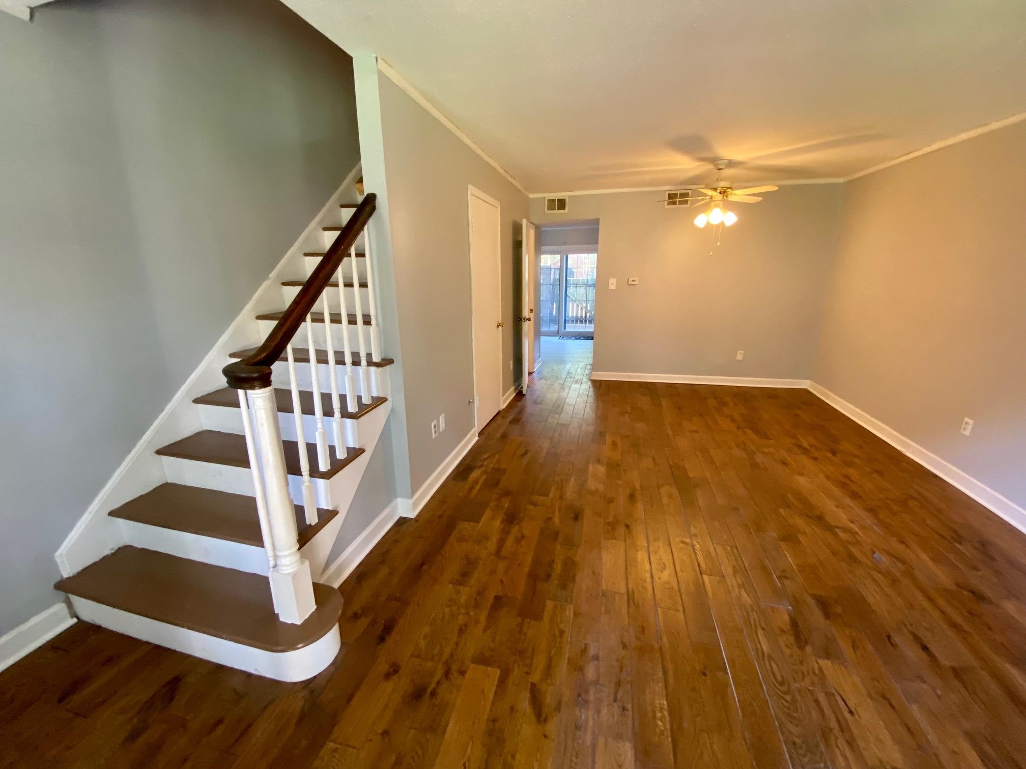 5700 Quince Road, Unit 4 Memphis, TN 38119 - Photo 2 of 16 a view of entryway and hall with wooden floor