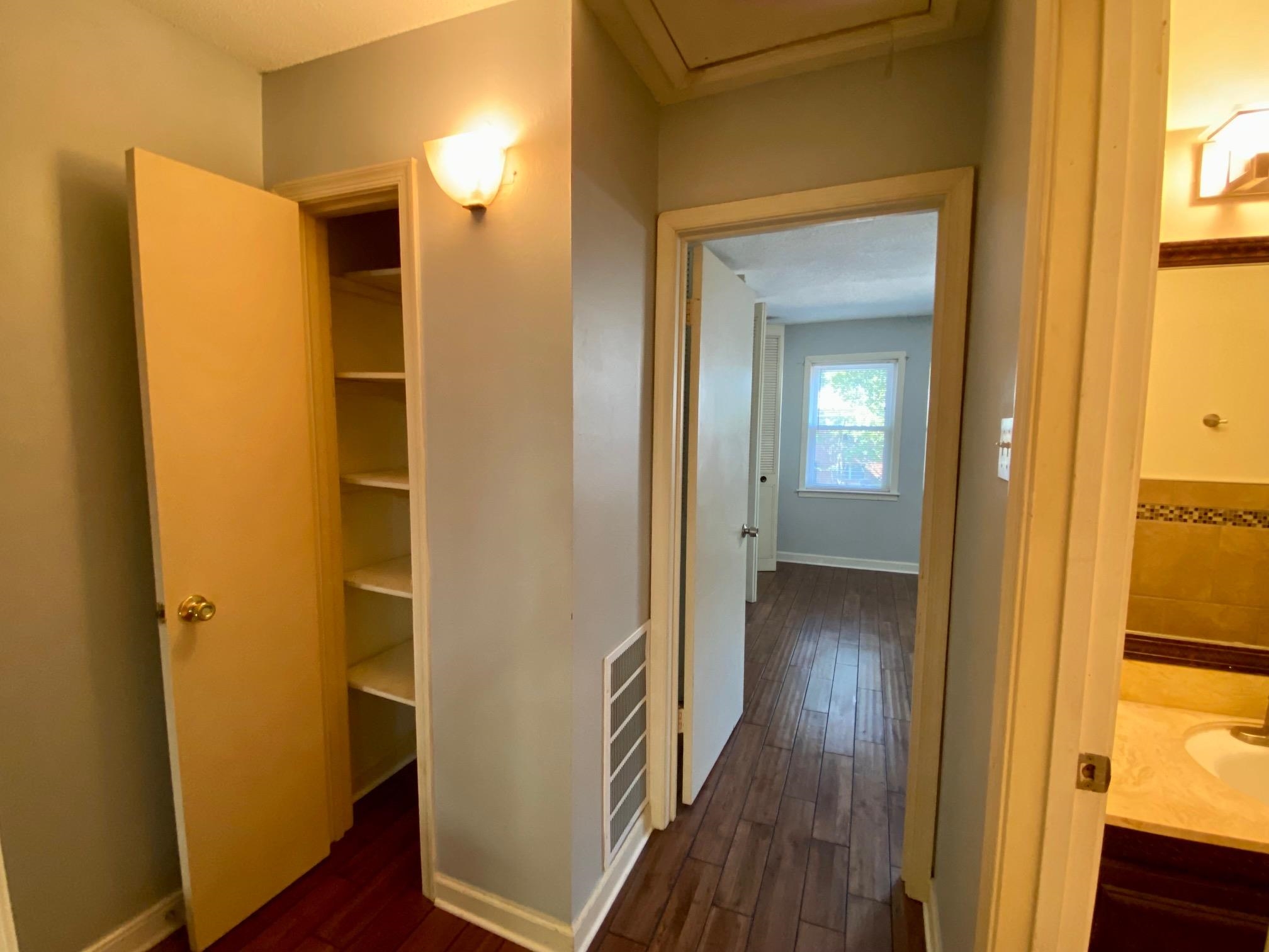 5700 Quince Road, Unit 4 Memphis, TN 38119 - Photo 8 of 16 a view of a hallway with wooden floor