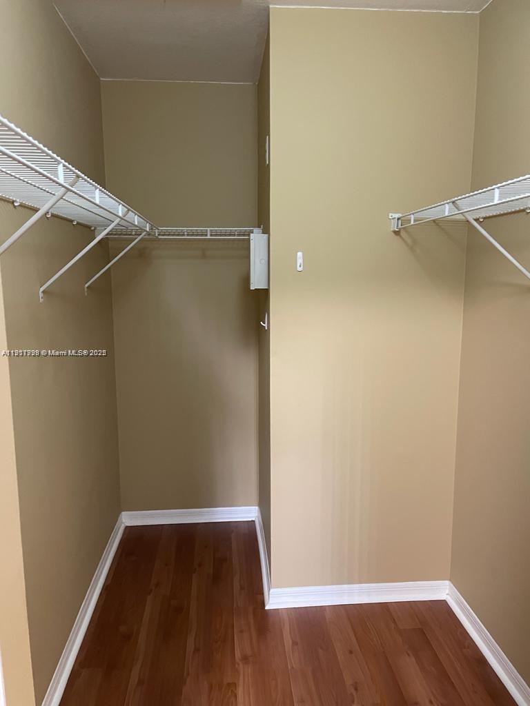 2920 Southeast 13th Road, Unit 20245 Homestead, FL 33035 - Photo 19 of 20 a view of a room with wooden floor