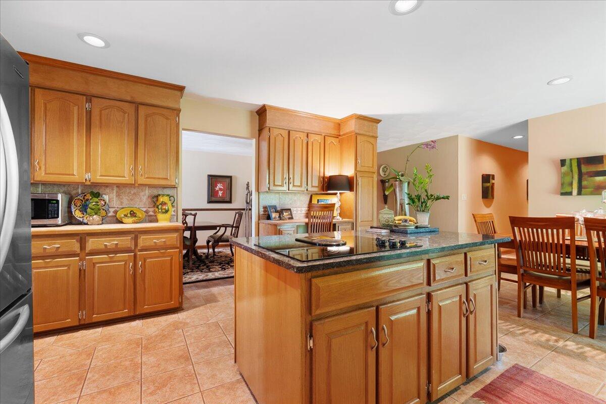453 Wirtz Road Wirtz, VA 24184 - Photo 16 of 69 a kitchen with stainless steel appliances granite countertop a sink and cabinets