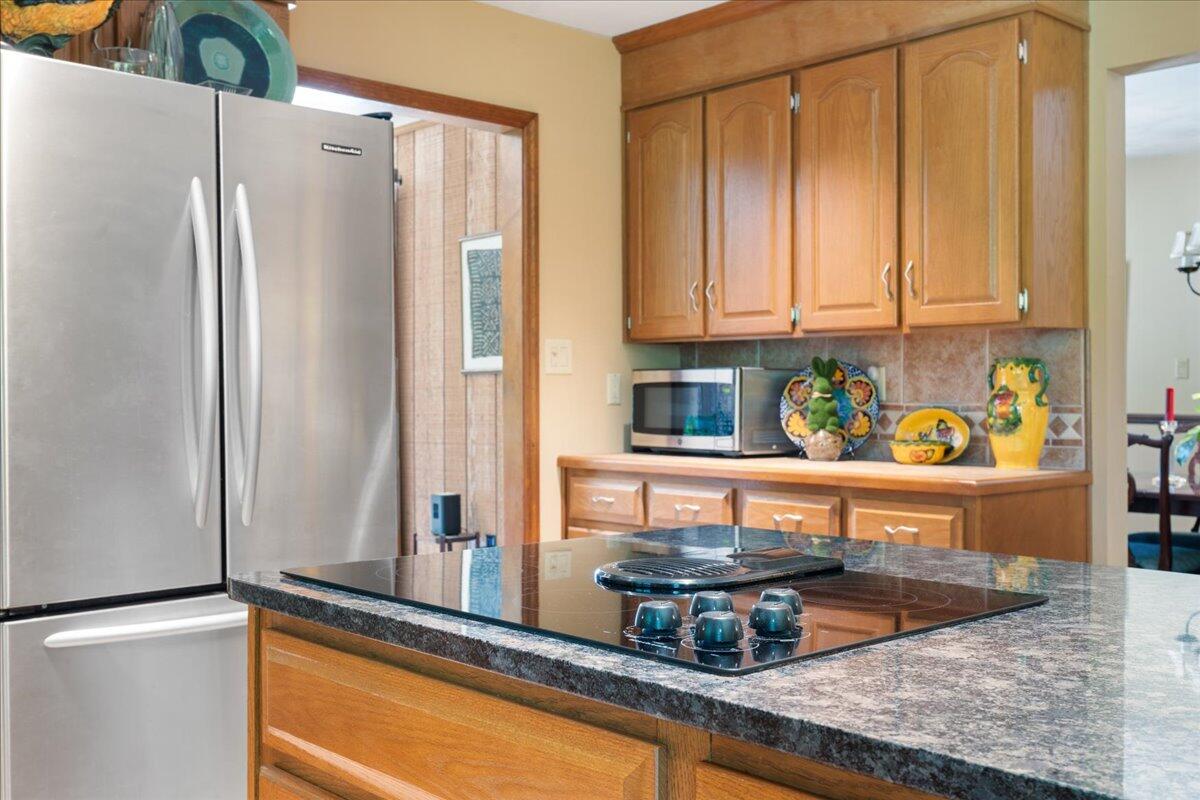 453 Wirtz Road Wirtz, VA 24184 - Photo 20 of 69 a kitchen with stainless steel appliances granite countertop a refrigerator and a sink