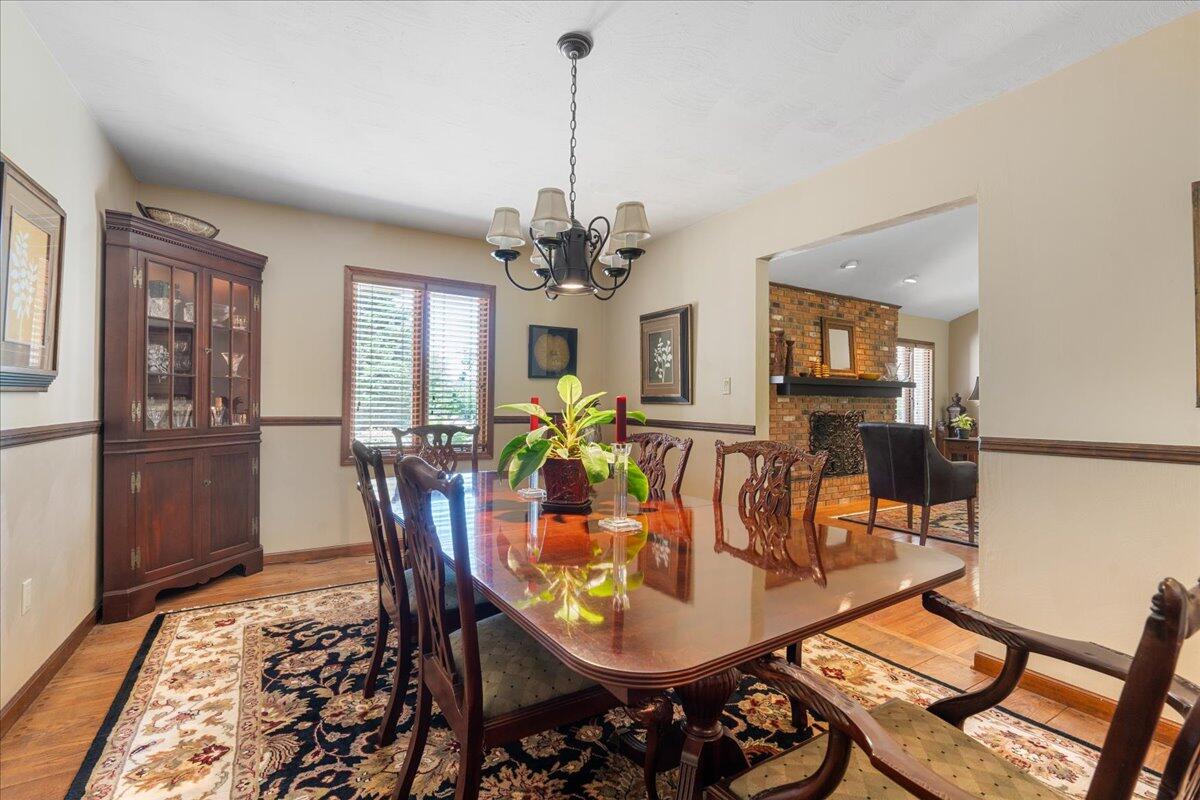 453 Wirtz Road Wirtz, VA 24184 - Photo 22 of 69 a view of a dining room with furniture window and wooden floor