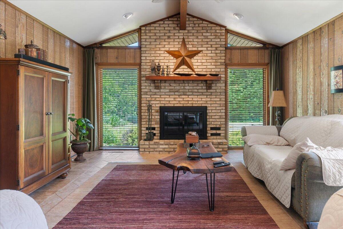 453 Wirtz Road Wirtz, VA 24184 - Photo 26 of 69 a living room with furniture a fireplace and a table