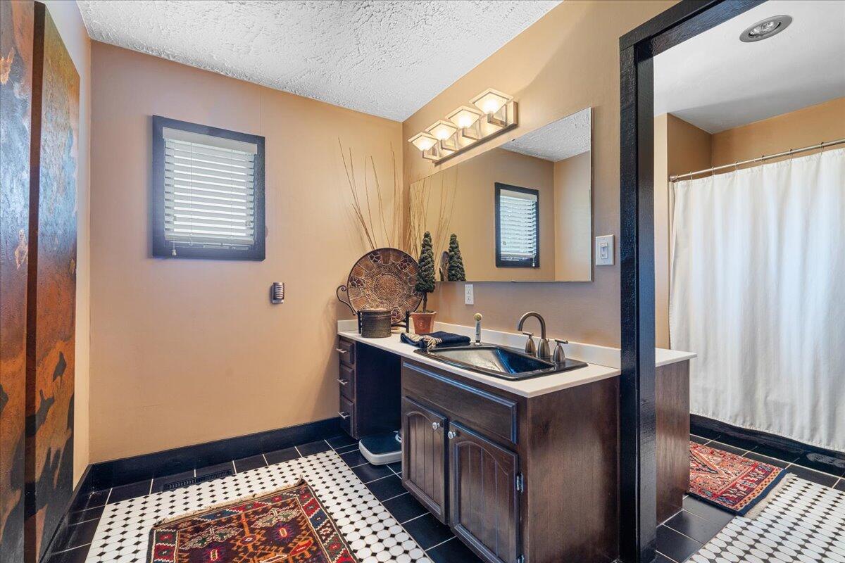 453 Wirtz Road Wirtz, VA 24184 - Photo 32 of 69 a bathroom with a sink and a mirror