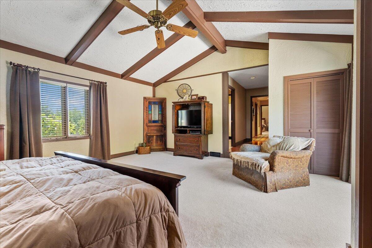 453 Wirtz Road Wirtz, VA 24184 - Photo 32 of 72 a bedroom with a bed and glass walk in closet