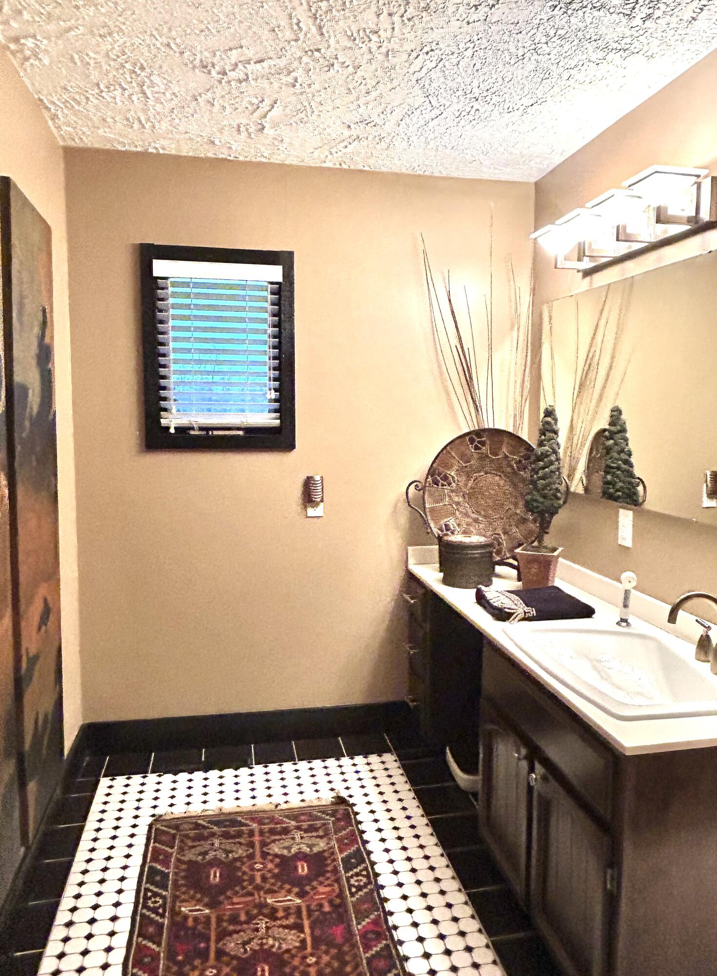 453 Wirtz Road Wirtz, VA 24184 - Photo 33 of 72 a bathroom with a sink a mirror and a window