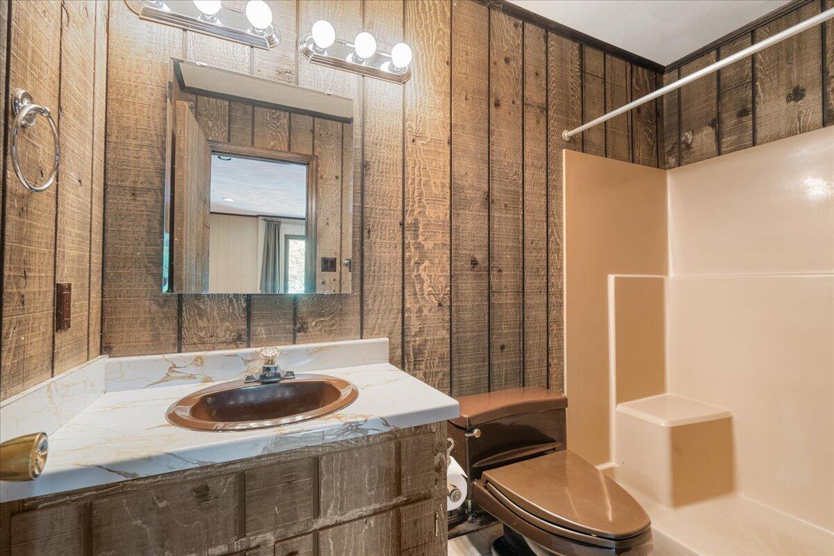 453 Wirtz Road Wirtz, VA 24184 - Photo 40 of 69 a bathroom with a sink and a mirror