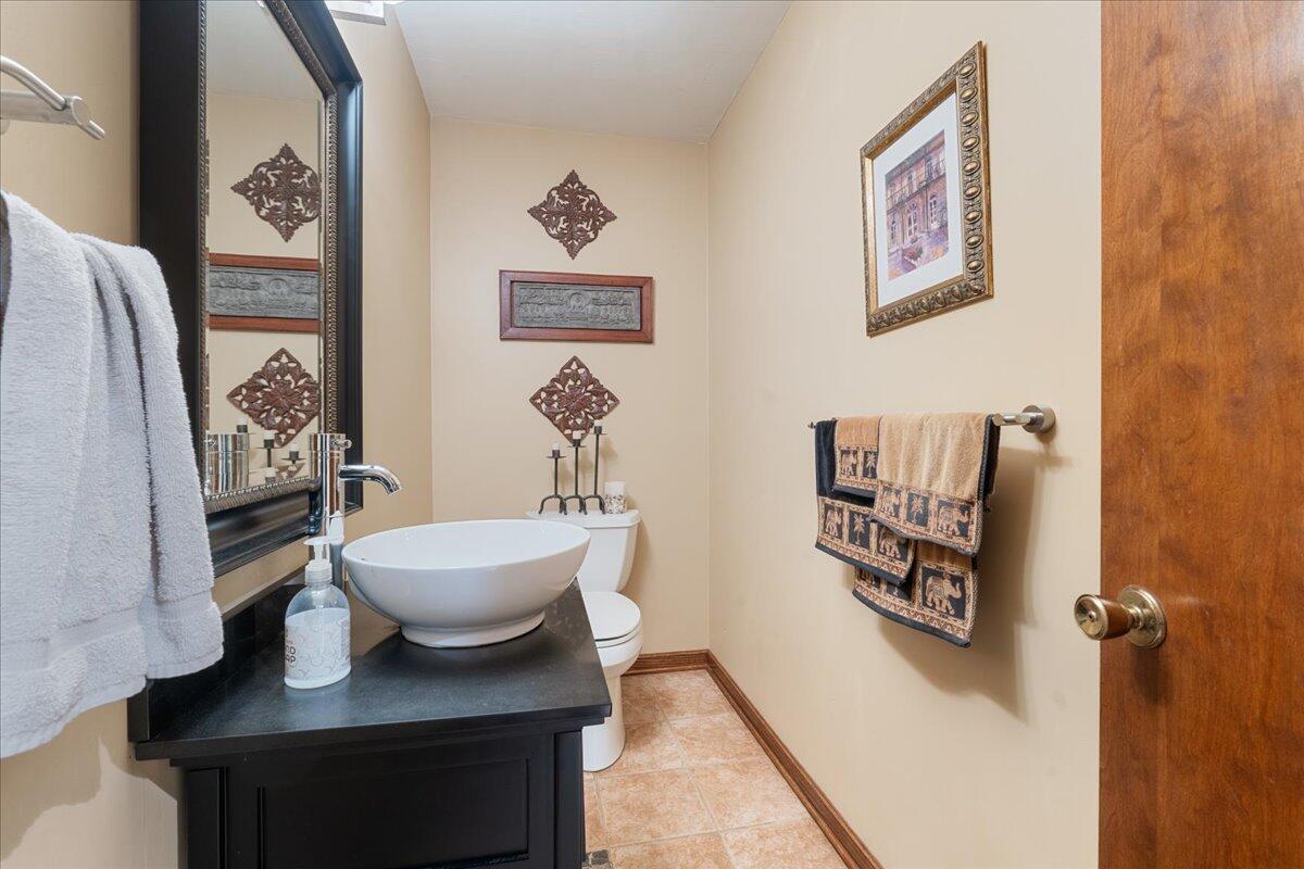 453 Wirtz Road Wirtz, VA 24184 - Photo 46 of 72 a bathroom with a sink mirror and toilet